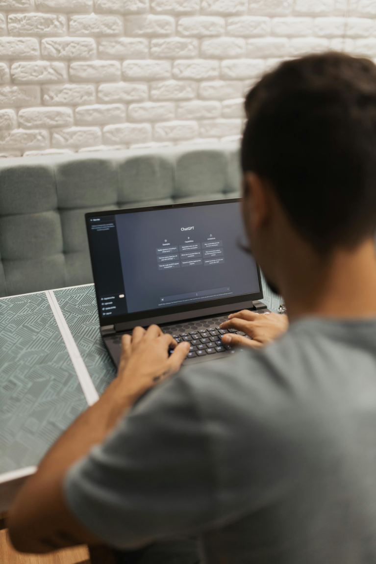 A person working on a laptop computer